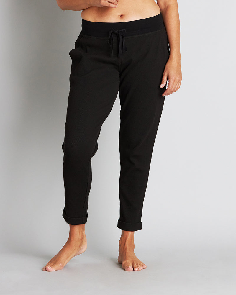 Model wears Mihika Sleeping Jogger in BLACK. On body front view