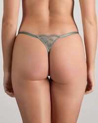 Model wears Romilly Thong in ICEBERG GREEN. On body back view