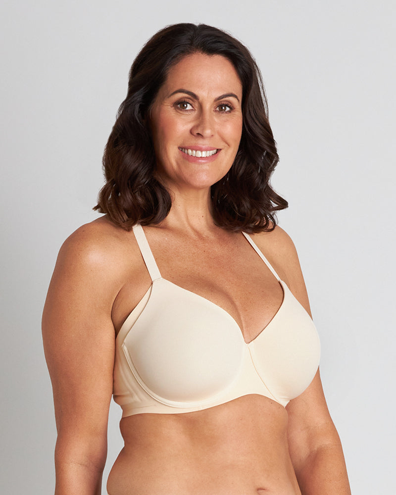 Model wears Comfit Collection Contour Bra in NOVELLE PEACH. On body side view
