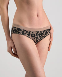 Model wears Seamless Jacquard Bikini in LEOPARD LOVER. On body side view