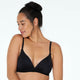 Model wears Bendon Body Wire Free Bra in BLACK. On body front view