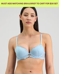 Model wears Jeanie Push Up Bra in OMPHALODES. On body front view