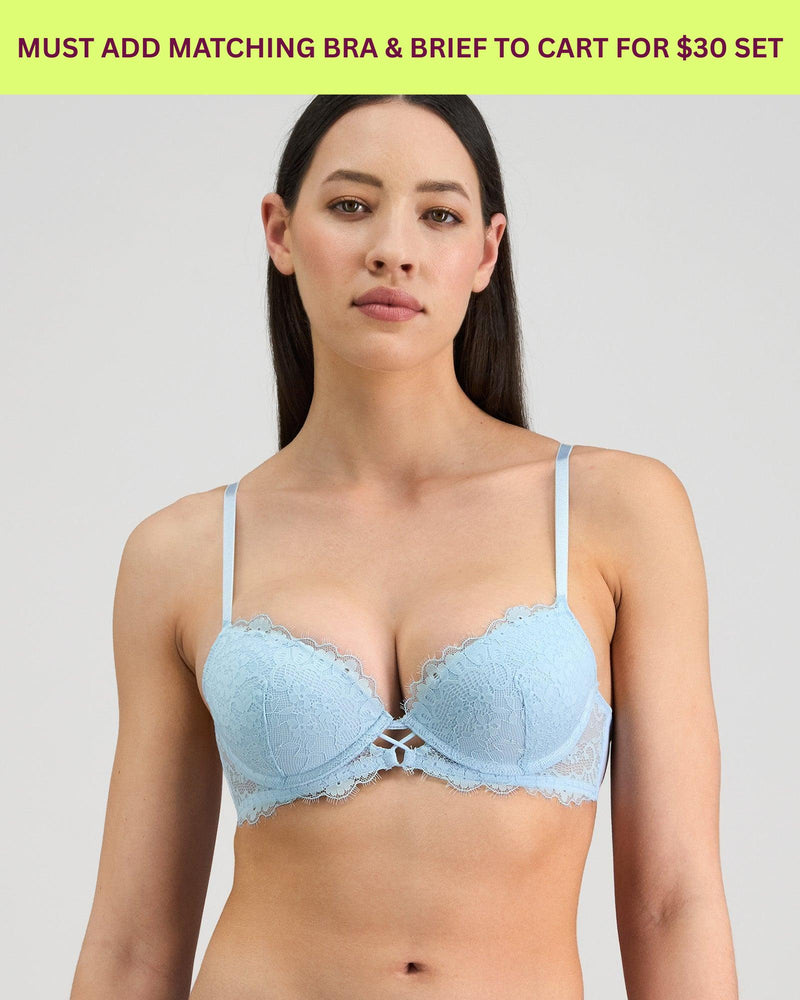 Model wears Jeanie Push Up Bra in OMPHALODES. On body front view