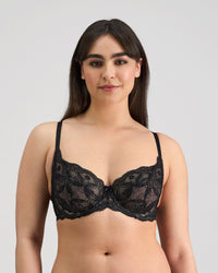 Model wears Juniper Underwire Bra in BLACK. On body front view