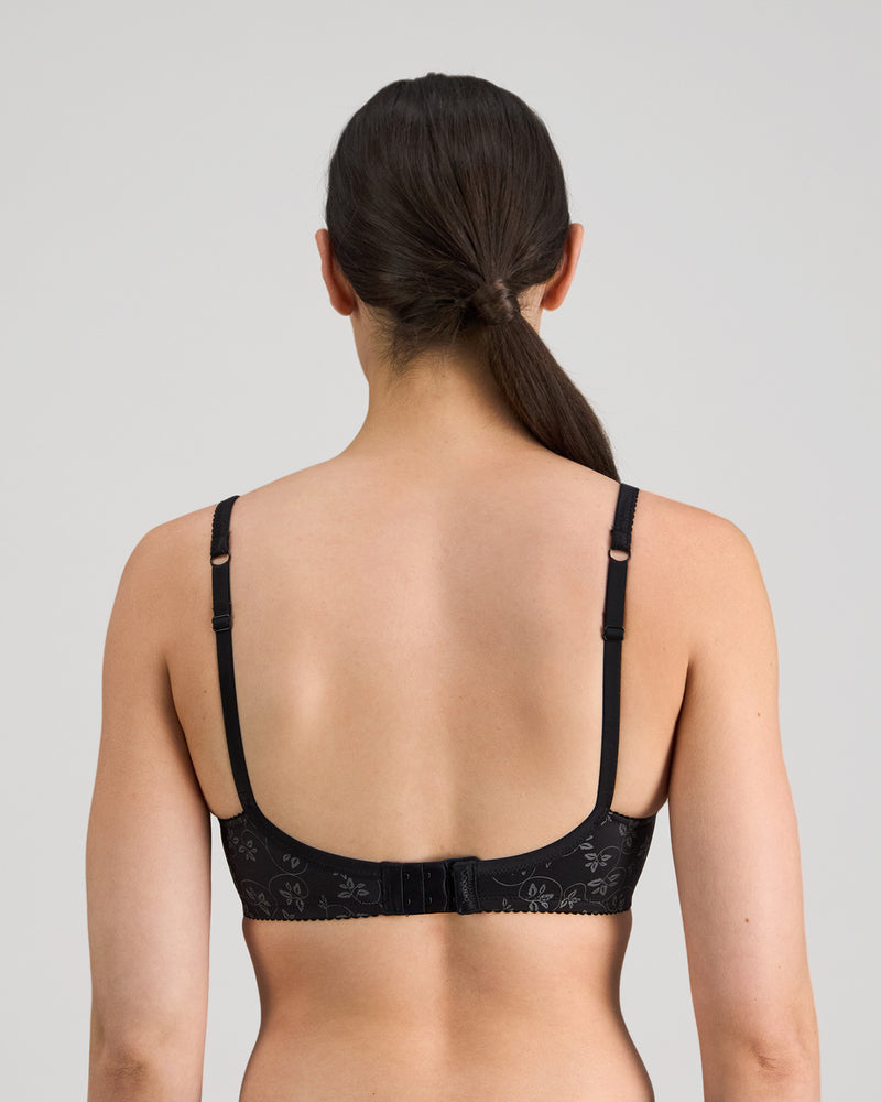 Model wears Yvette Underwire Bra in BLACK. On body back view