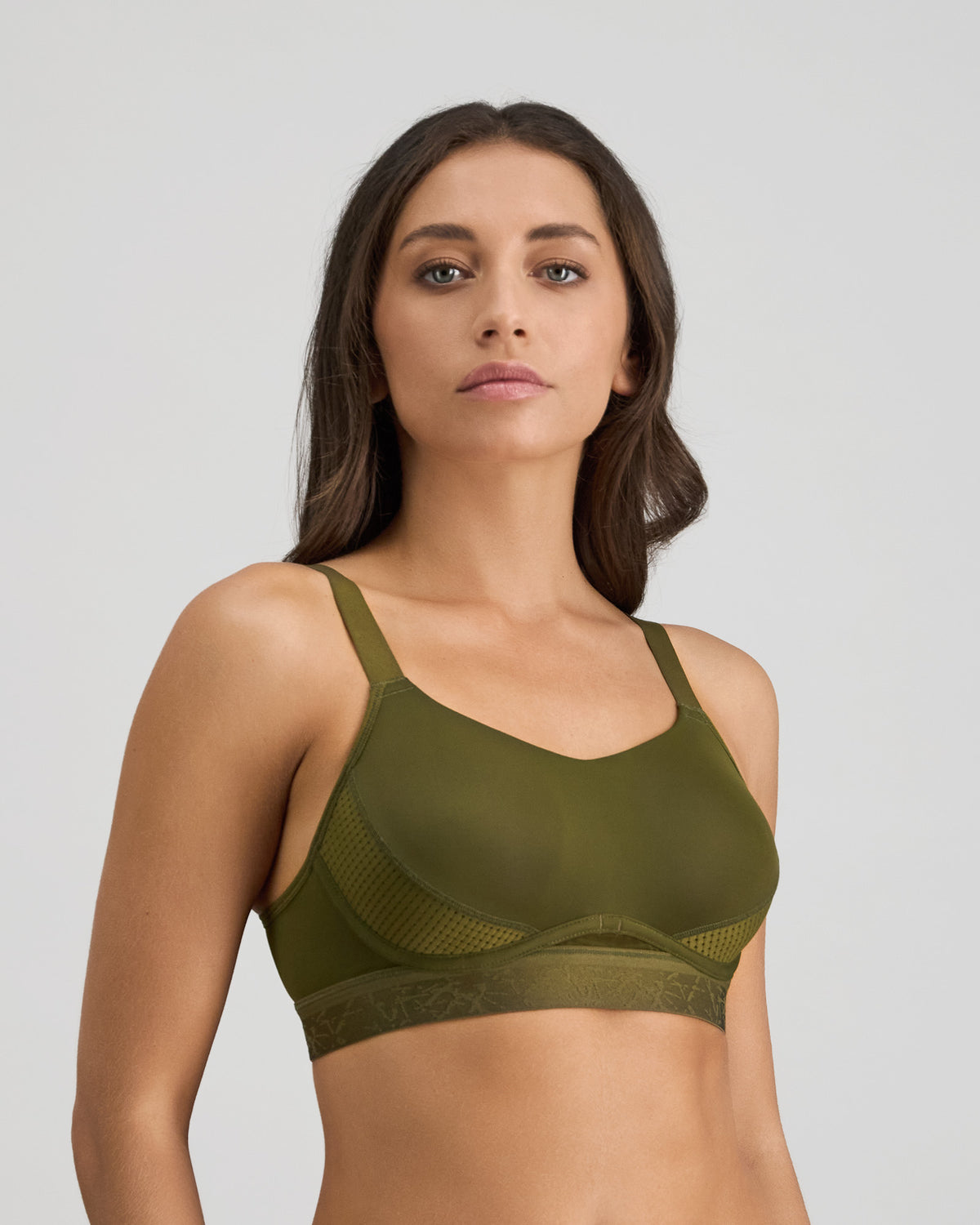 Model wears Bendon Breathe Contour Bra in DARK OLIVE/PINK. On body side view