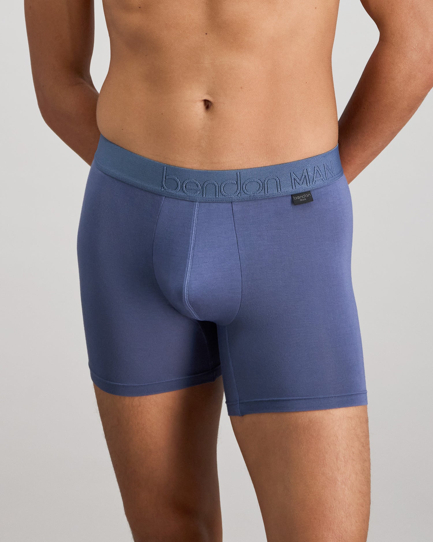 Model wears Bamboo Mens Trunk in VINTAGE INDIGO. On body front view
