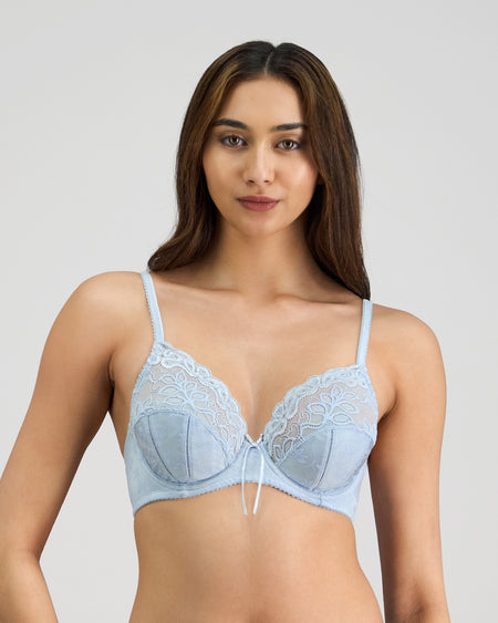 Model wears Yvette Underwire Bra in SKYWAY. On body front view