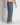 Model wears Lounge Long PJ Pant in ALOE CHECK. On body side view