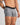 Model wears Everyday Essential Mens Trunk in GREY MARL. On body side view