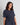 Model wears Sleep-Talk Short Sleeve Top in NIGHT SKY. On body side view