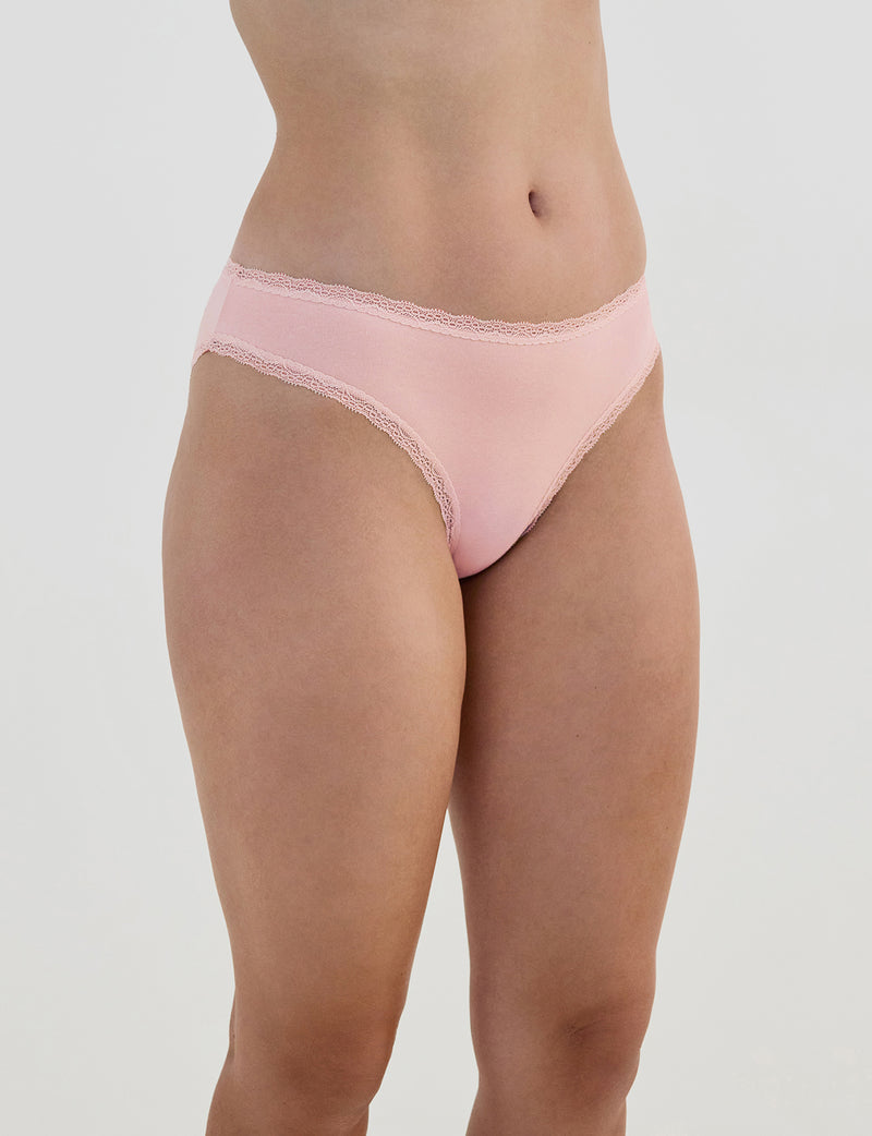 Model wears Stretch Cotton Bikini in ICY PINK. On body side view