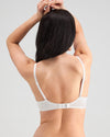 Model wears Alice Contour Bra in WHITE. On body back view