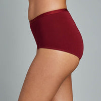 Model wears Body Cotton Full Brief Twin Pack in RHUBARB/LINEN. On body side view