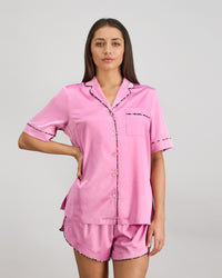 Model wears Holly Short PJ Set in FUCHSIA PINK. On body front view