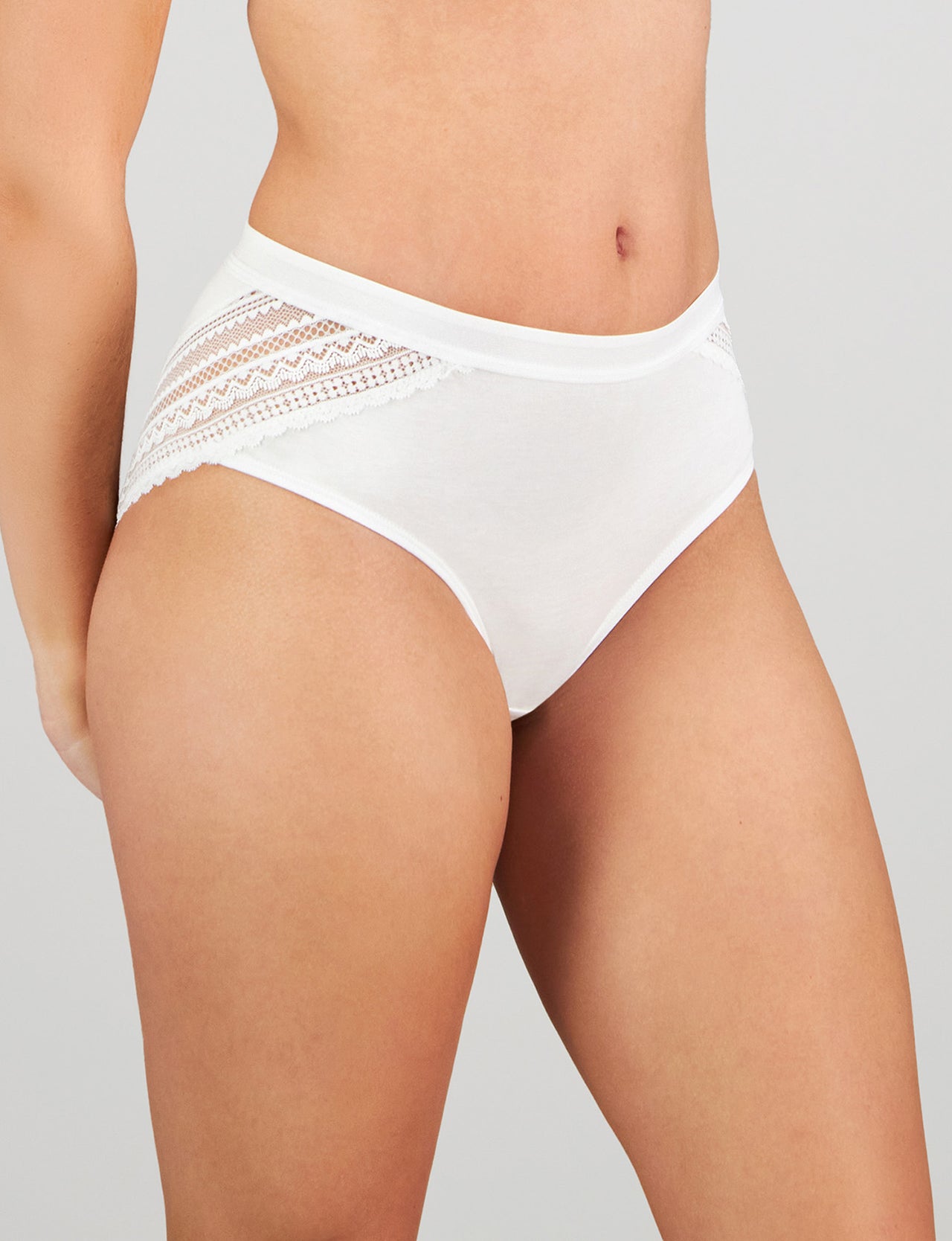 Model wears Angelica Midi in WHITE. On body side view