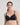 Model wears Simply Seamless Contour Bra in BLACK. On body front view