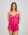 Model wears Eva Jean Short in FANTASY FUCHSIA. On body front view