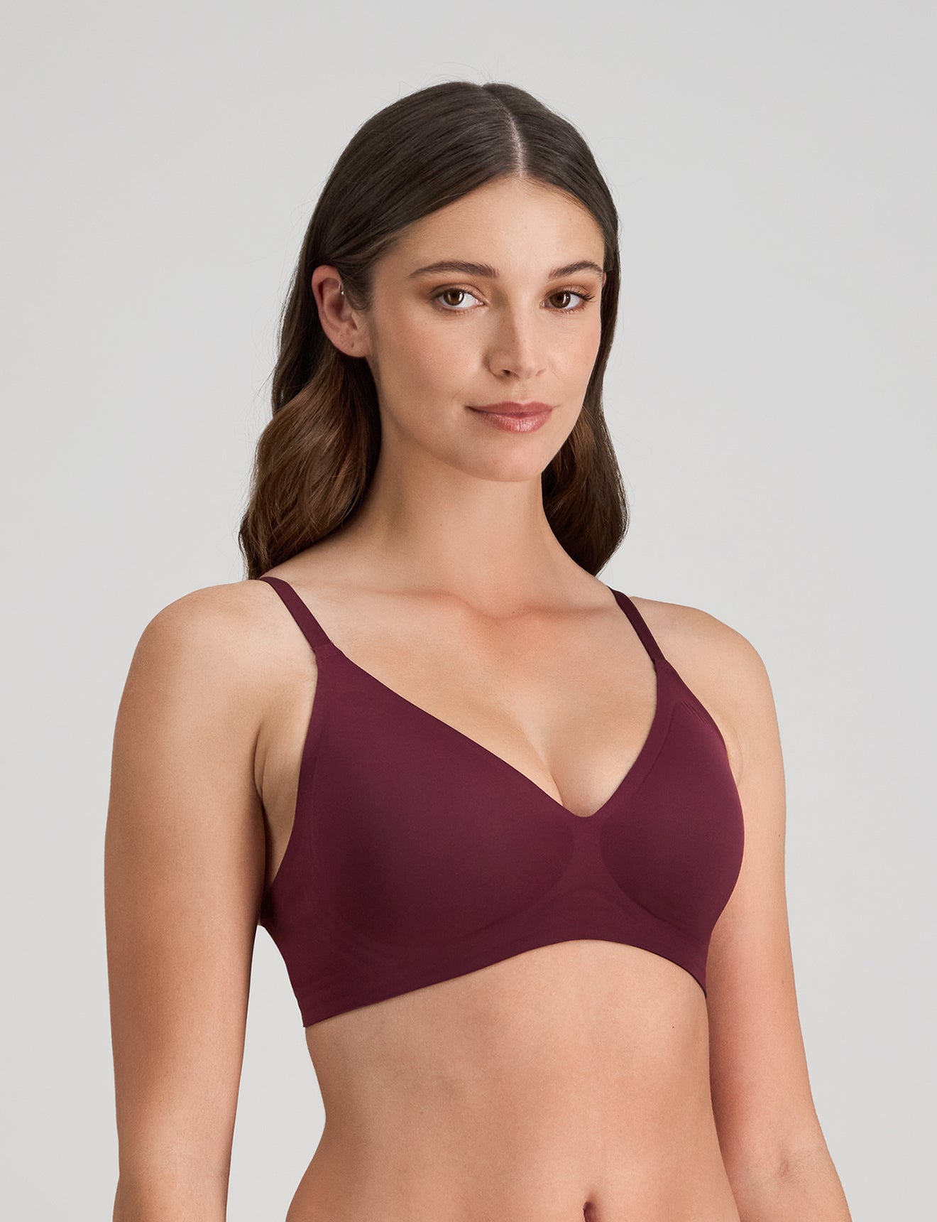 Model wears Comfit Collection Wire Free Bra in FIG. On body side view