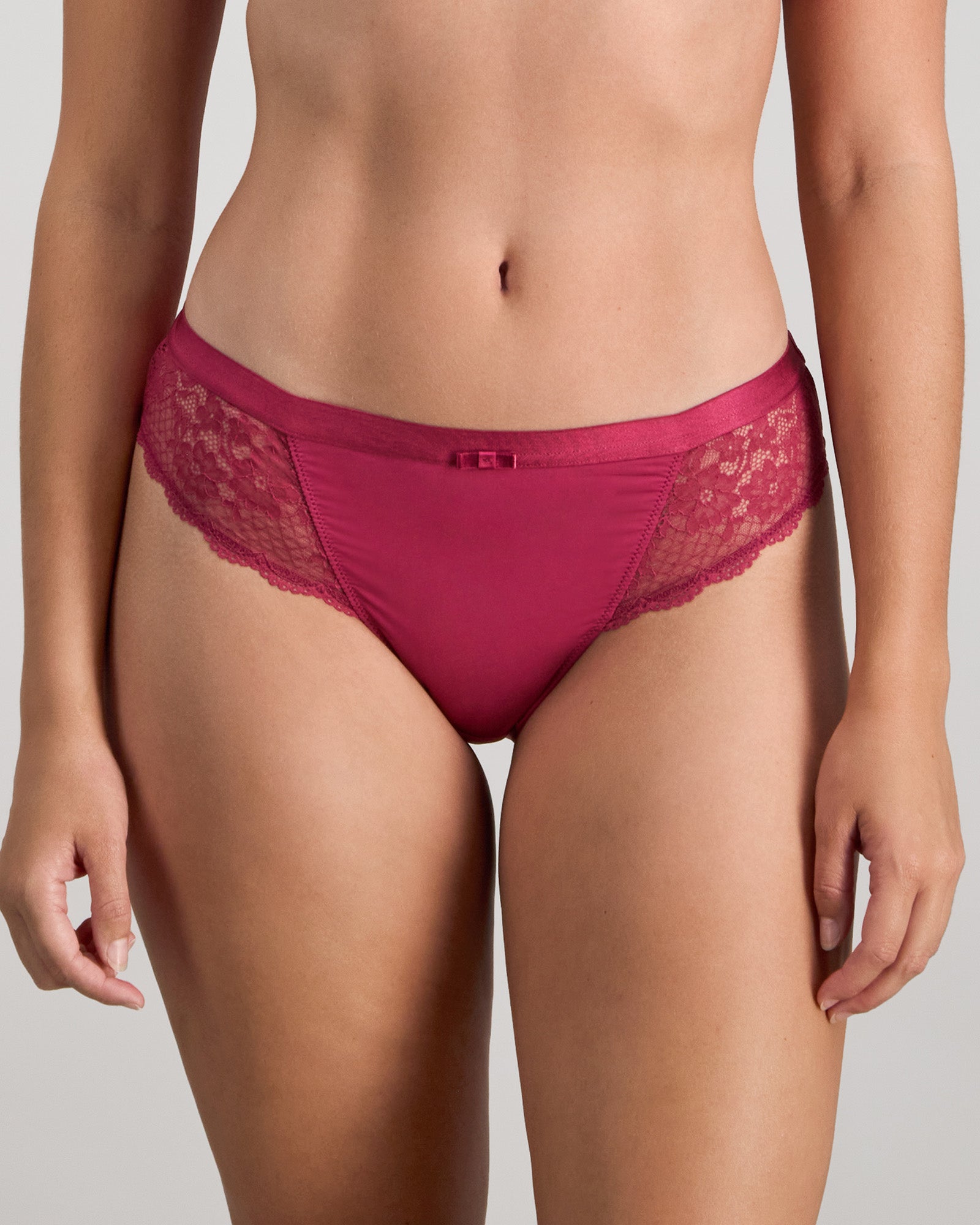 Model wears Legacy Bikini in BEAUJOLAIS. On body front view