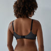 Model wears Elodie Maternity Bra in JET/PEWTER. On body back view