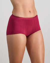 Model wears Body Cotton Full Brief in BEAUJOLAIS. On body side view