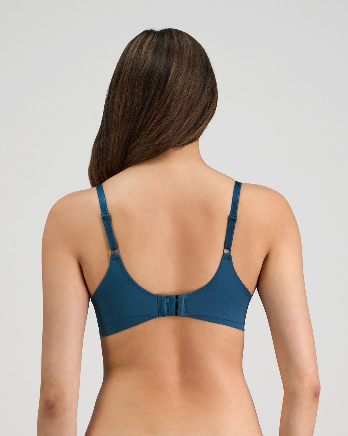 Model wears Flawless Form Contour Bra in MEDITERRANEA. On body back view