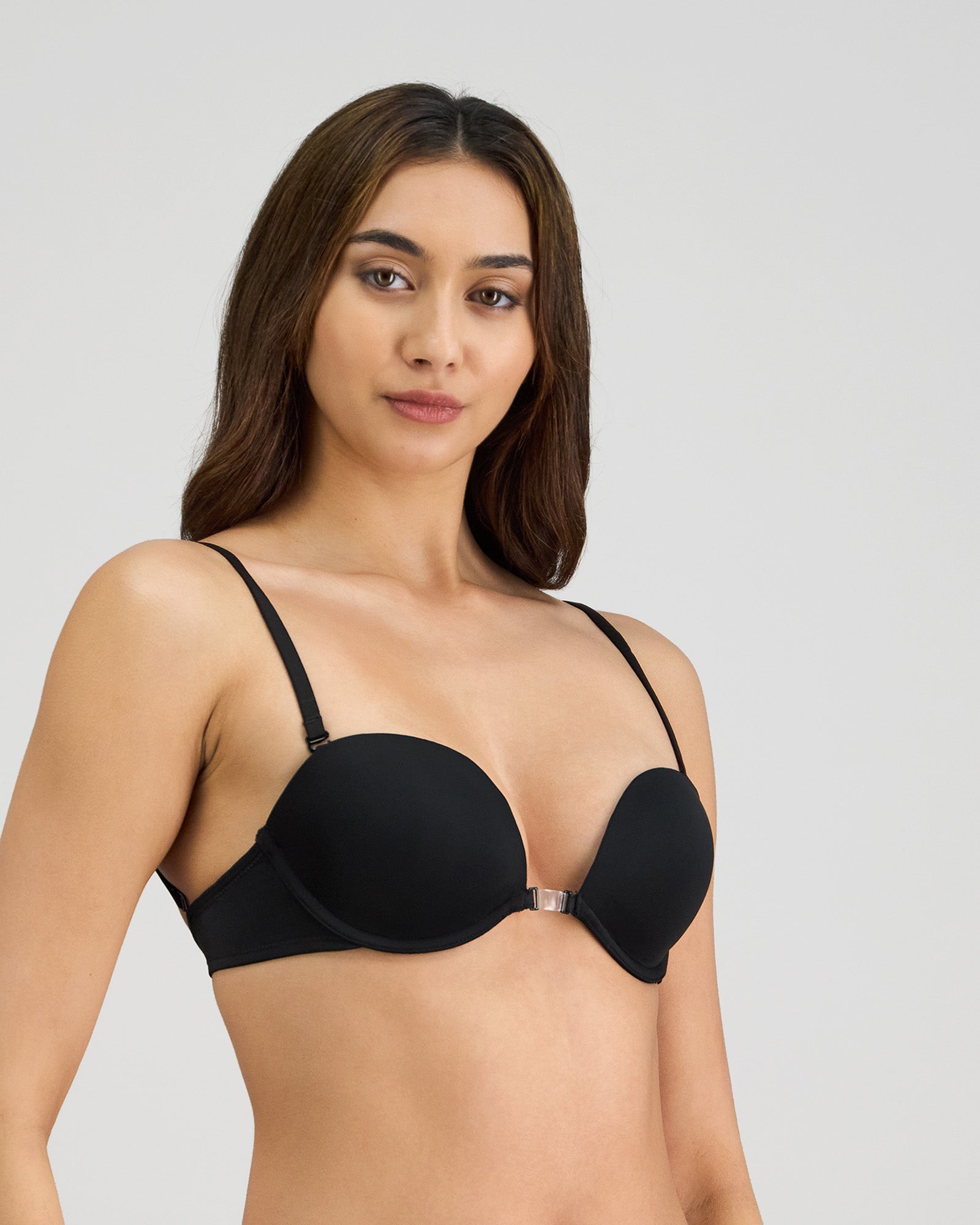 Model wears Infinity Multiway Convertible Bra in BLACK. On body side view