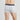 Model wears Organic Cotton Mens Trunk in LIGHT GREY MARL. On body back view