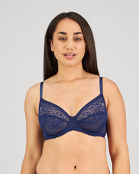 Model wears Eternal Underwire Bra in Medieval Blue. On body front view
