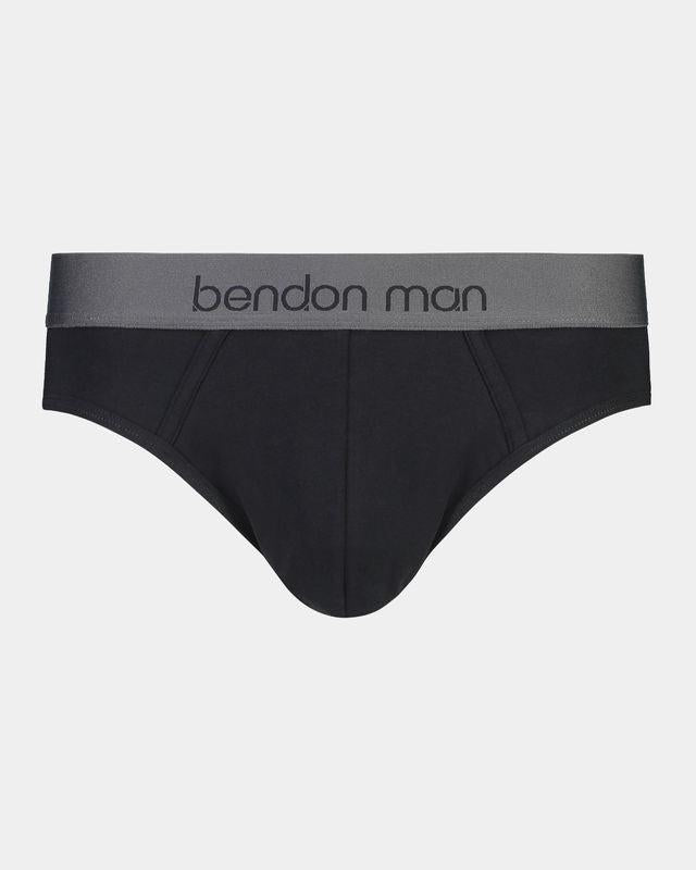 Model wears Cotton Low-Rise Mens Brief in BLACK. On body front view