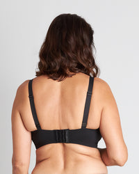 Model wears Comfit Collection Wire Free Bra in BLACK. On body back view