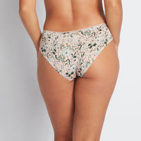 Model wears Rosemary Bikini in PEACHY PINK PRINT. On body back view