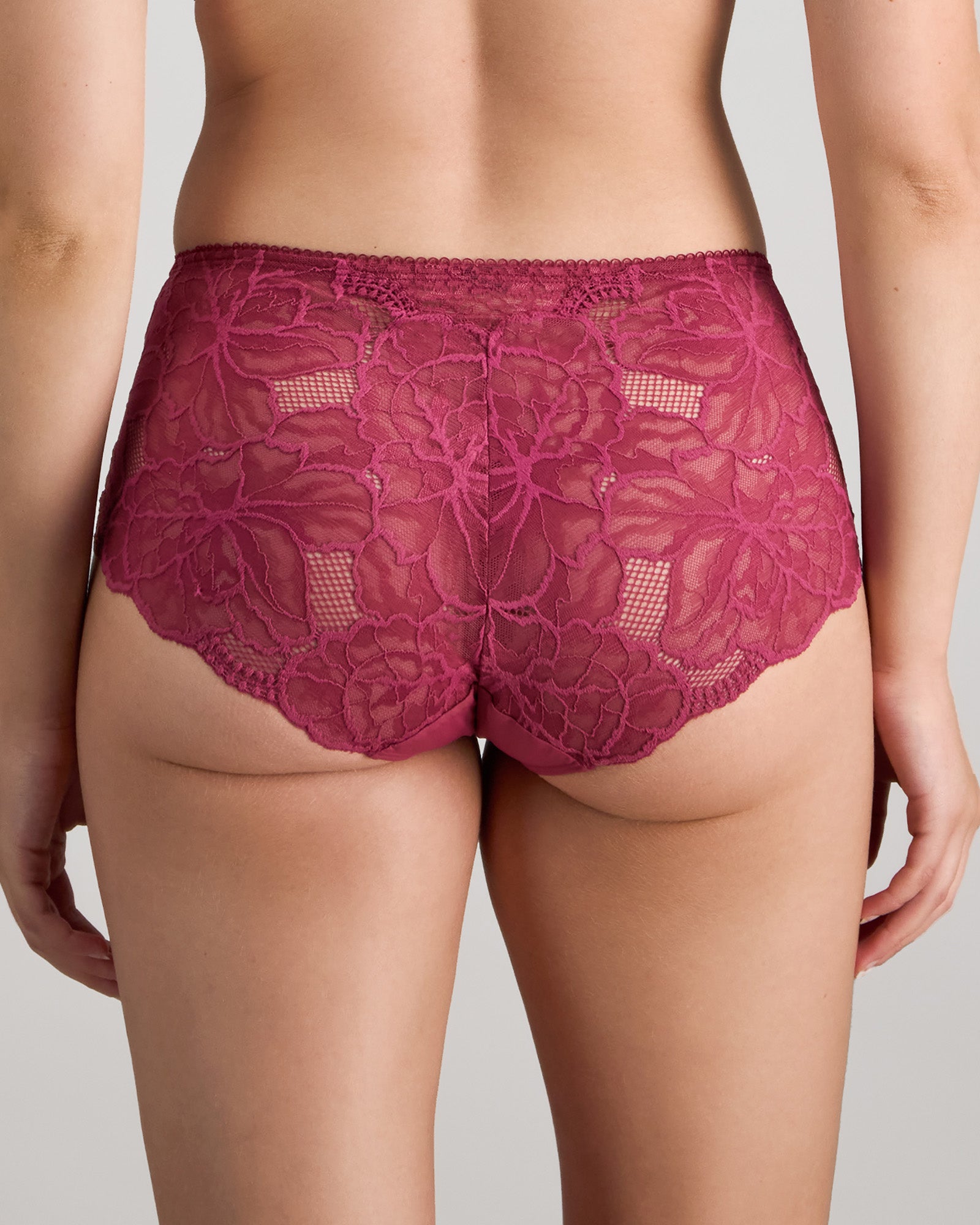 Model wears Midnight Express Full Brief in BEAUJOLAIS. On body back view