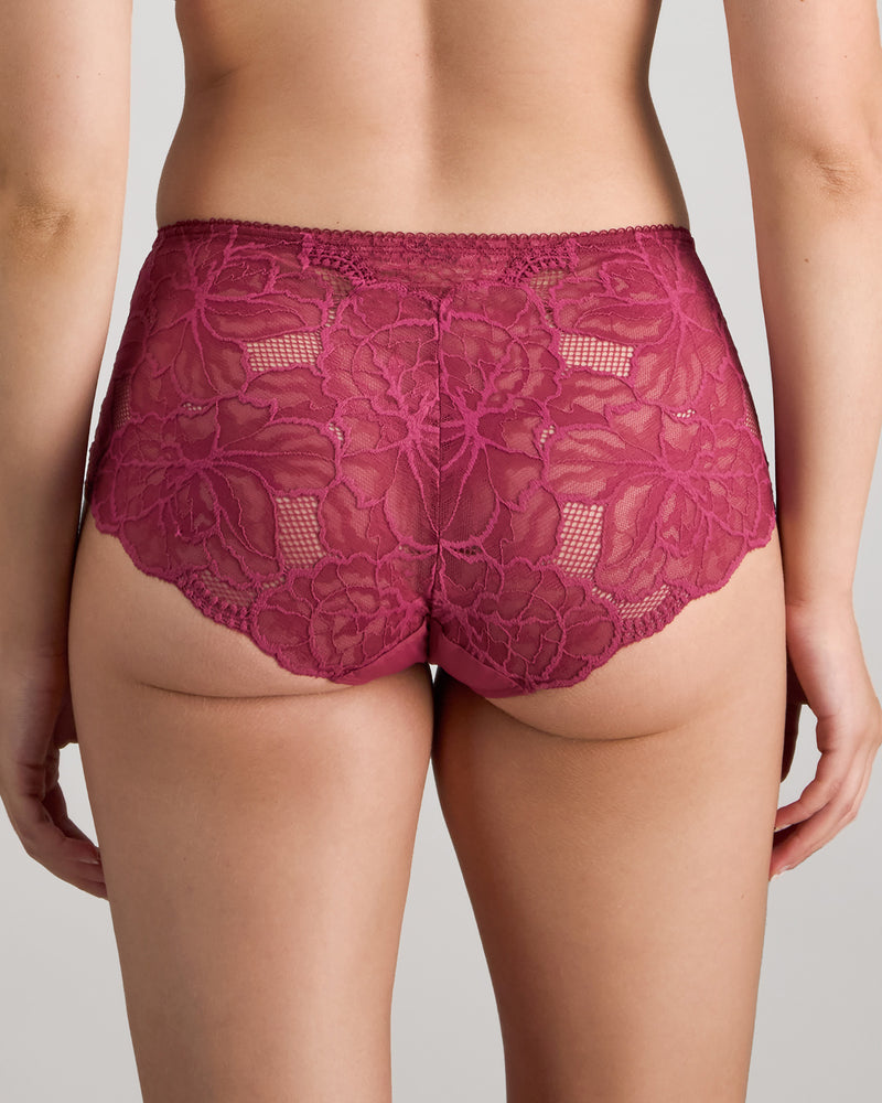 Model wears Midnight Express Full Brief in BEAUJOLAIS. On body back view