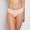 Model wears No Show Bikini in LATTE. On body front view