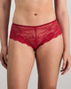 Model wears My Fit Lace Brazilian in JESTER RED. On body front view