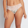 Model wears Rosemary Bikini in PEACHY PINK PRINT. On body front view