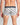 Model wears Retros Print Mens Trunk in ART DECO TILE PRINT. On body back view