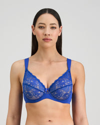 Model wears Intrigue Contour Bra in DAZZLING BLUE. On body front view