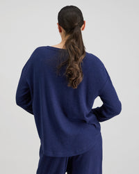 Model wears Relaxed Rib Long Sleeve Pj Top in NAVY BLAZER. On body back view