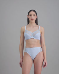 model-poses-in-light-blue-lingerie-set
