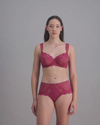 model-poses-in-red-bra-and-underwear-set