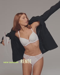 video-of-model-posing-in-white-lingerie-set