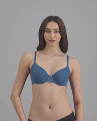 model-poses-in-blue-bra
