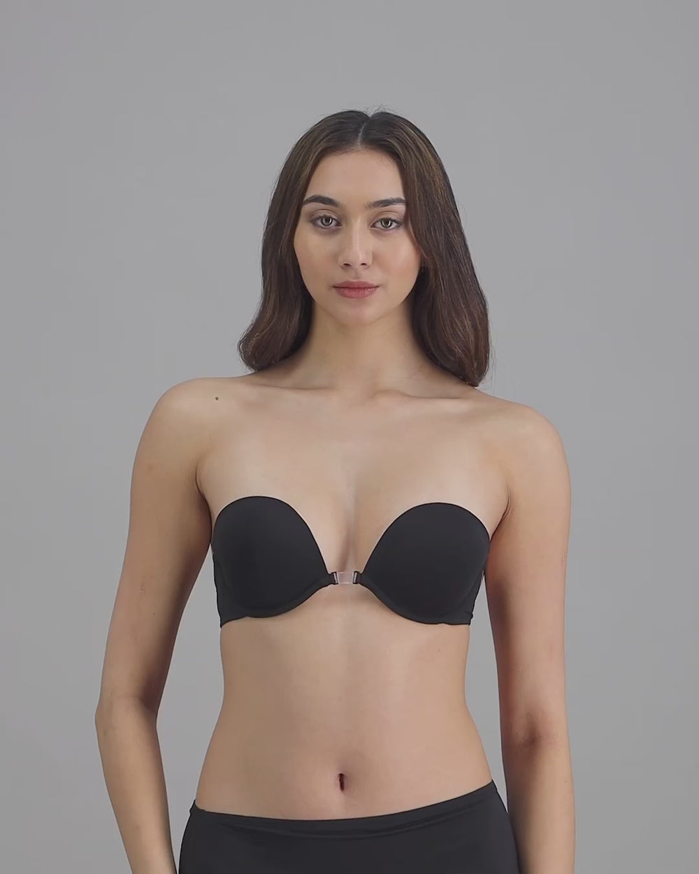 model-poses-in-black-strapless-bra