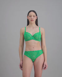 model-poses-in-green-lingerie-set