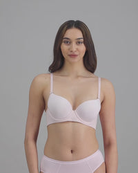 model-poses-in-light-pink-lingerie-set