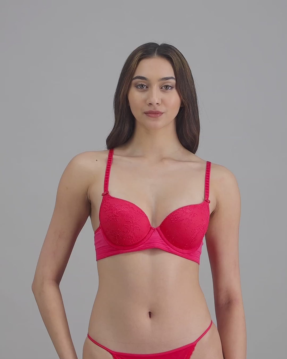 model-poses-in-red-lingerie-set