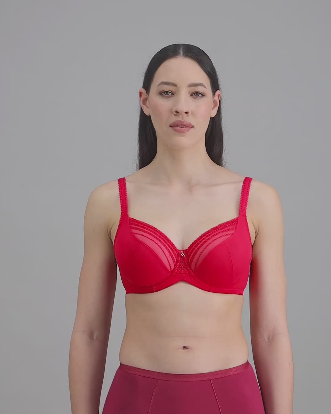 model-poses-in-red-lingerie-set